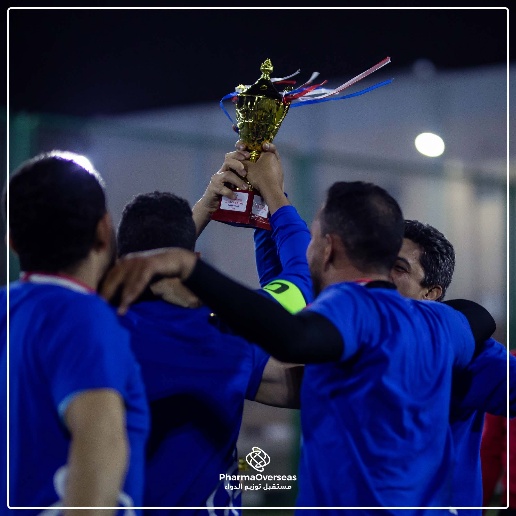 PharmaOverseas employees celebrating at the Ramadan Football Tournament